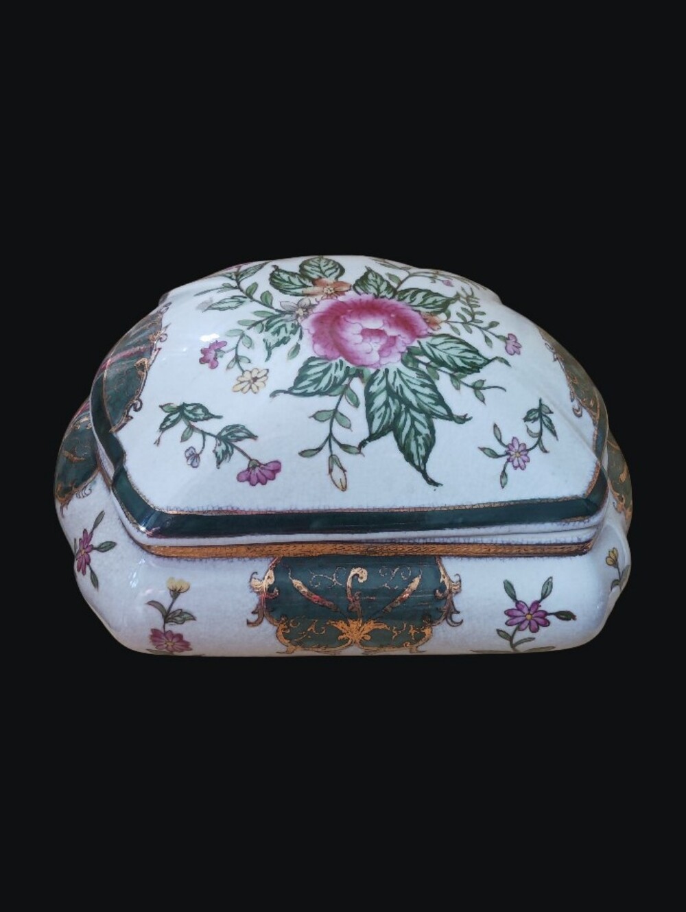 Vintage Porcelain Trinket Box Featuring a Hand-Painted Floral Motifs